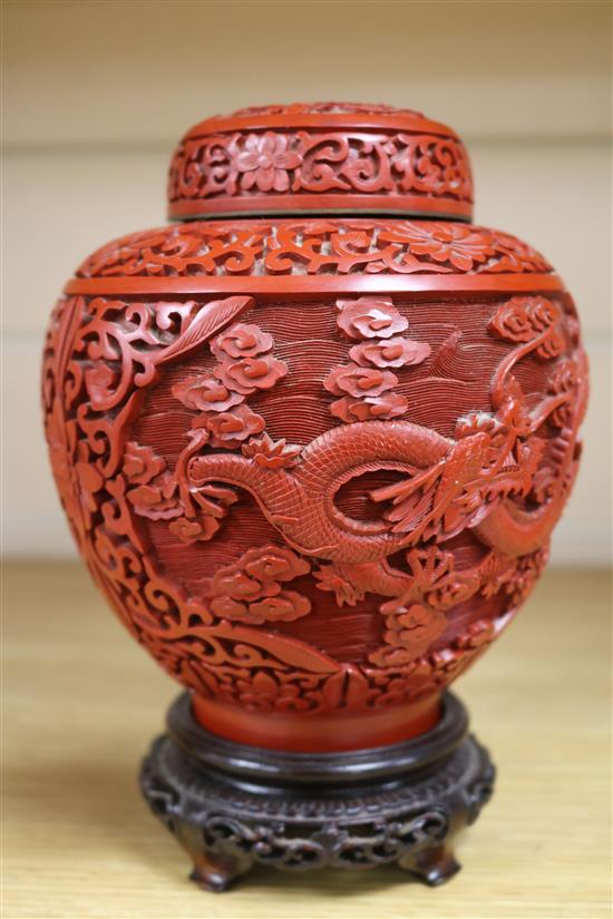 A Chinese cinnabar lacquer jar and cover